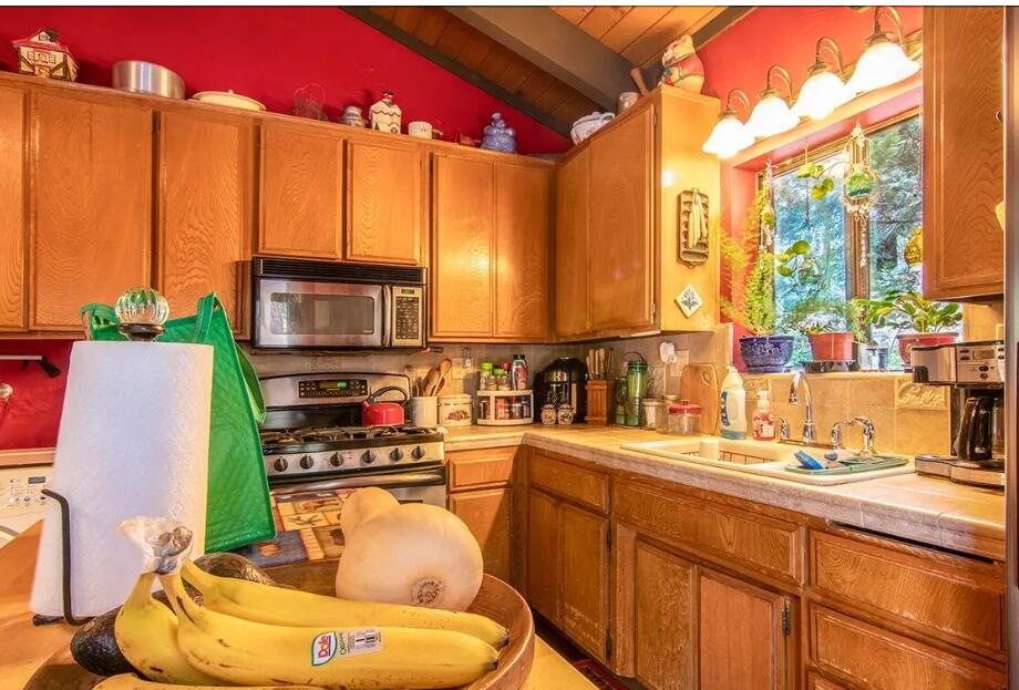 52845 Pine Cove Road Idyllwild, CA 92549 - Photo 7 of 15 a kitchen with a sink a stove and furniture