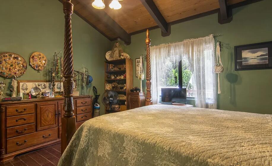52845 Pine Cove Road Idyllwild, CA 92549 - Photo 10 of 15 a bedroom with a bed and a dresser