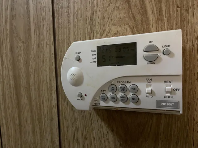 a bathroom with a double vanity sink mirror and bathtub
