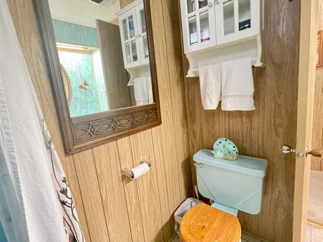 a bathroom with a shower and a sink