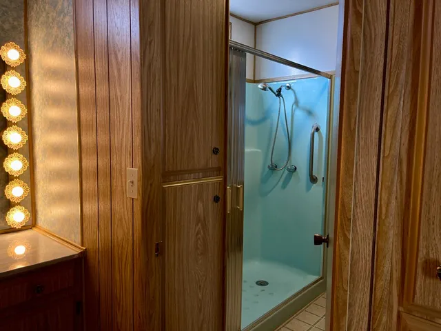 a dining room with furniture and chandelier