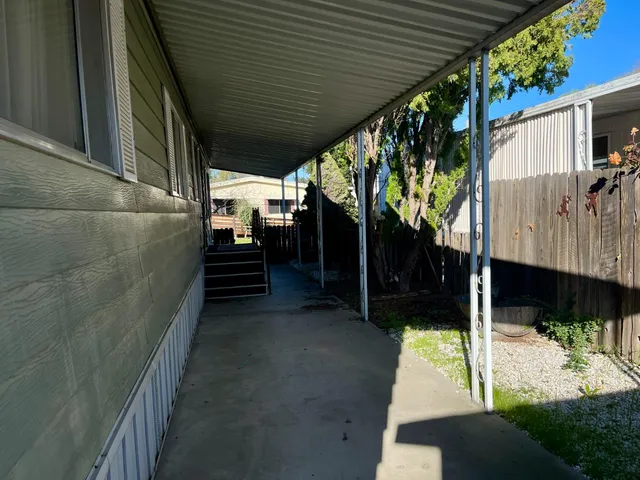 a street sign on a pole on a street