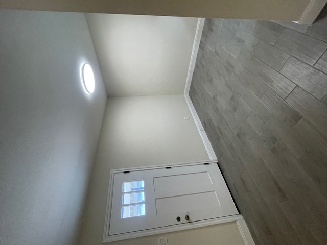 1403 Braes Ridge Drive, Unit B Austin, TX 78723 - Photo 6 of 6 an empty room with a natural light