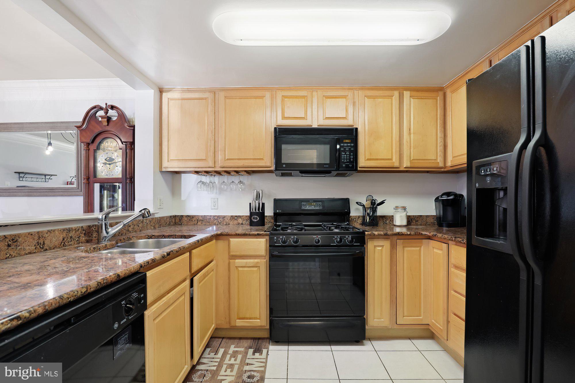 2570 Riva Road, Unit 6C Annapolis, MD 21401 - Photo 8 of 27 Oak cabinetry and tile flooring