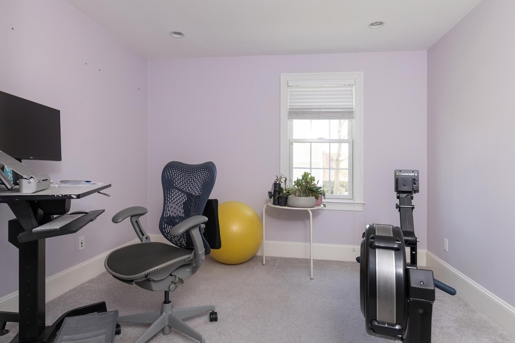 38 Maple Street, Unit 38 Needham, MA 02492 - Photo 9 of 14 a view of a workspace with furniture and a window