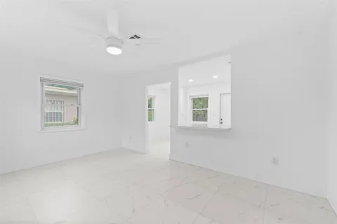 an empty room with windows