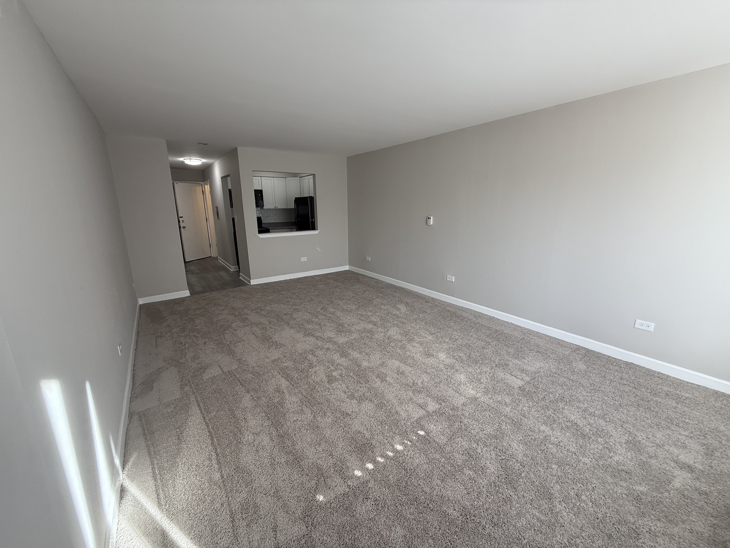 7300 West North Avenue, Unit 1A Elmwood Park, IL 60707 - Photo 10 of 15 a view of an empty room and kitchen