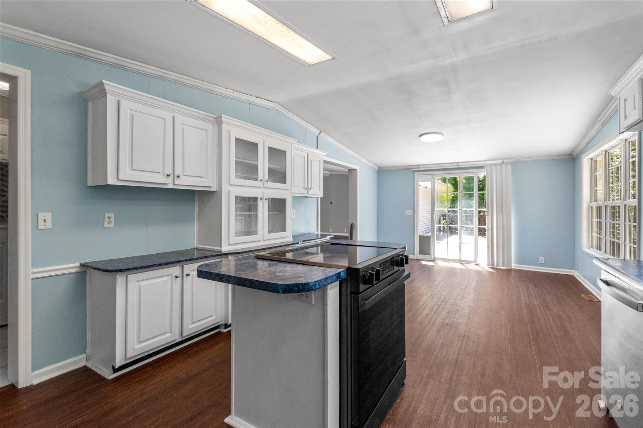 434 Rutledge Drive Catawba, SC 29704 - Photo 16 of 39 a kitchen that has a stove and a wooden floor