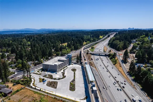 an aerial view of a house with mountain view