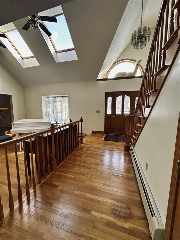 42 Pine Acres Road Foxboro, MA 02035 - Photo 9 of 40 a view of entryway and hall with wooden floor