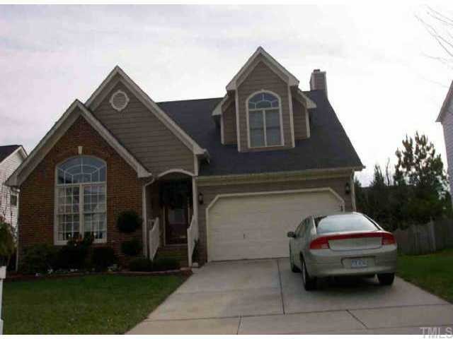 2313 Millstaff Court Raleigh, NC 27613 - Photo 1 of 1 a front view of a house with a garden
