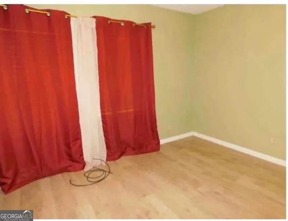 a view of a room with a window