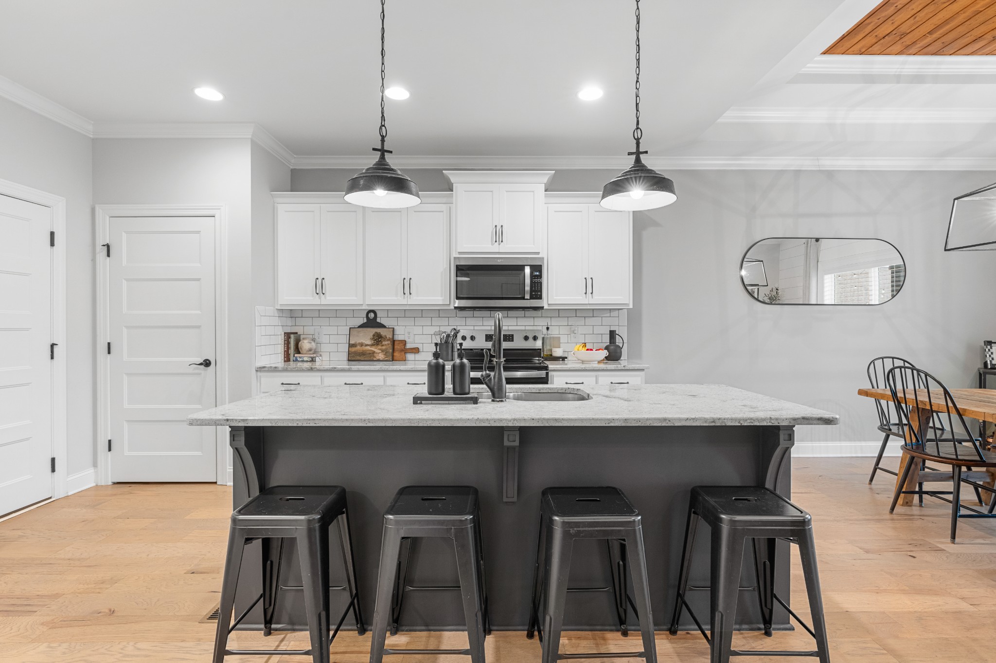 111 Flat Woods Road Lebanon, TN 37090 - Photo 17 of 60 a kitchen with stainless steel appliances kitchen island a chandelier