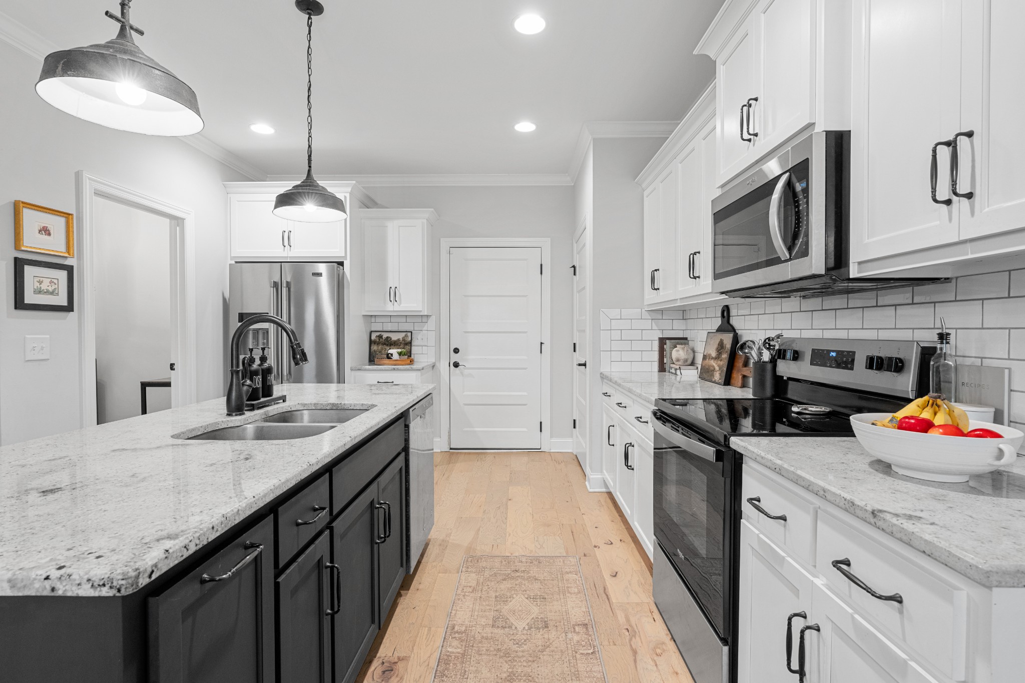 111 Flat Woods Road Lebanon, TN 37090 - Photo 19 of 60 a kitchen with stainless steel appliances granite countertop a sink and a stove