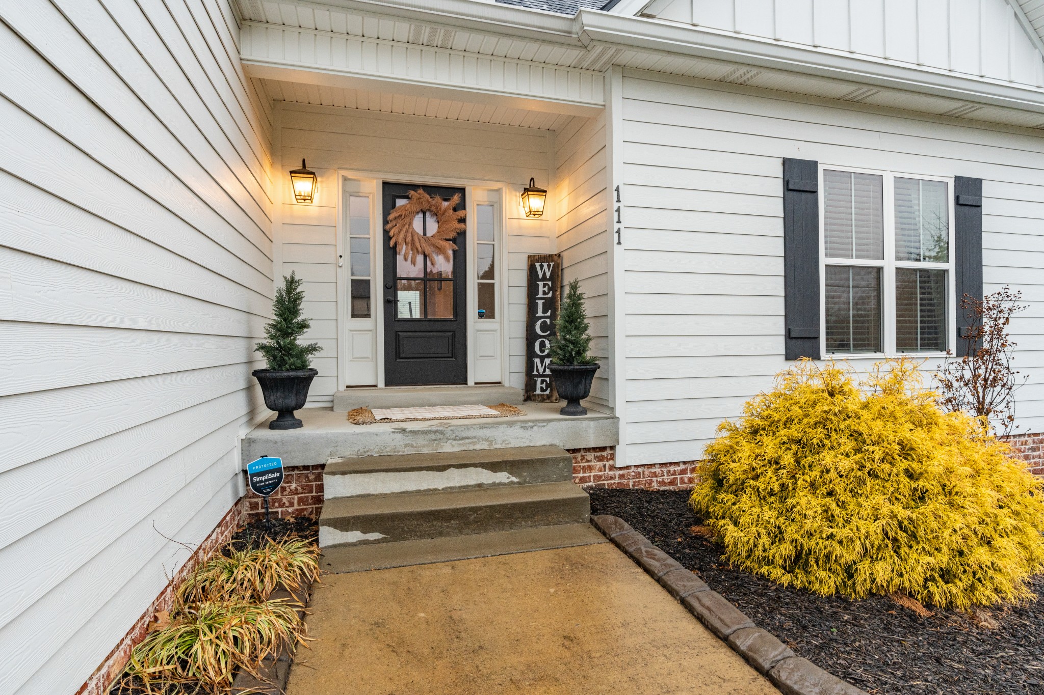 111 Flat Woods Road Lebanon, TN 37090 - Photo 2 of 60 a view of house with large windows and flower pot