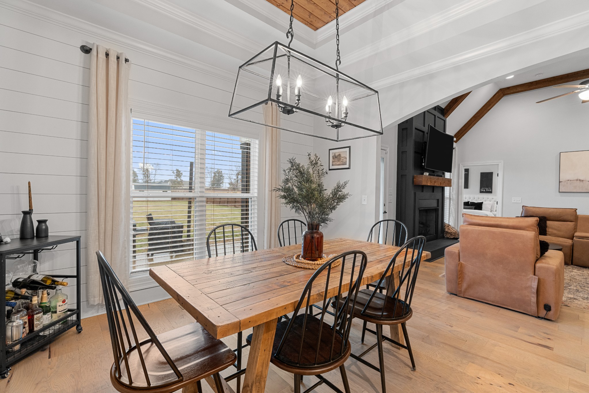 111 Flat Woods Road Lebanon, TN 37090 - Photo 22 of 60 a dining room with furniture a chandelier and wooden floor