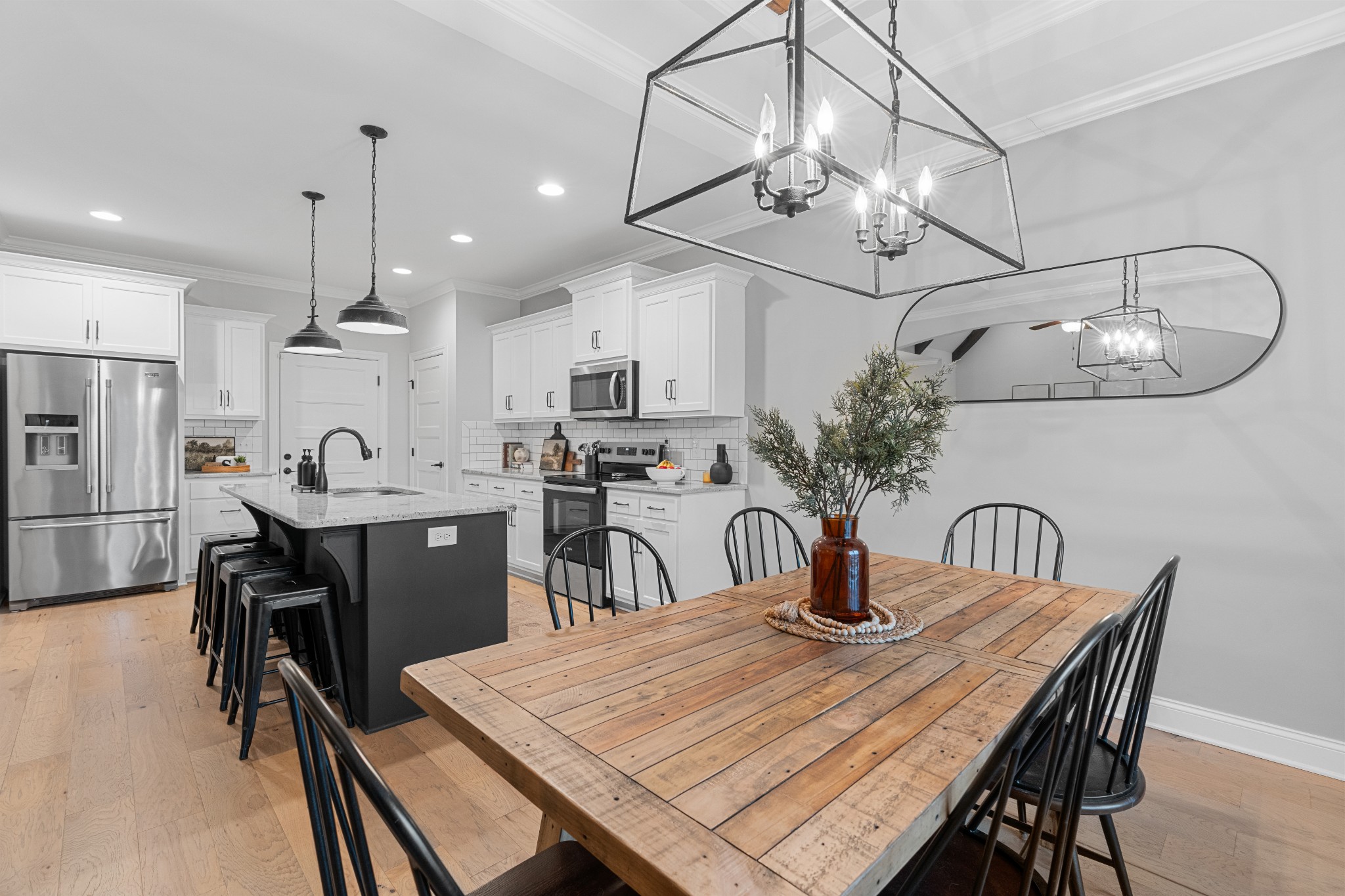 111 Flat Woods Road Lebanon, TN 37090 - Photo 24 of 60 a dining room filled chandelier and wooden floor