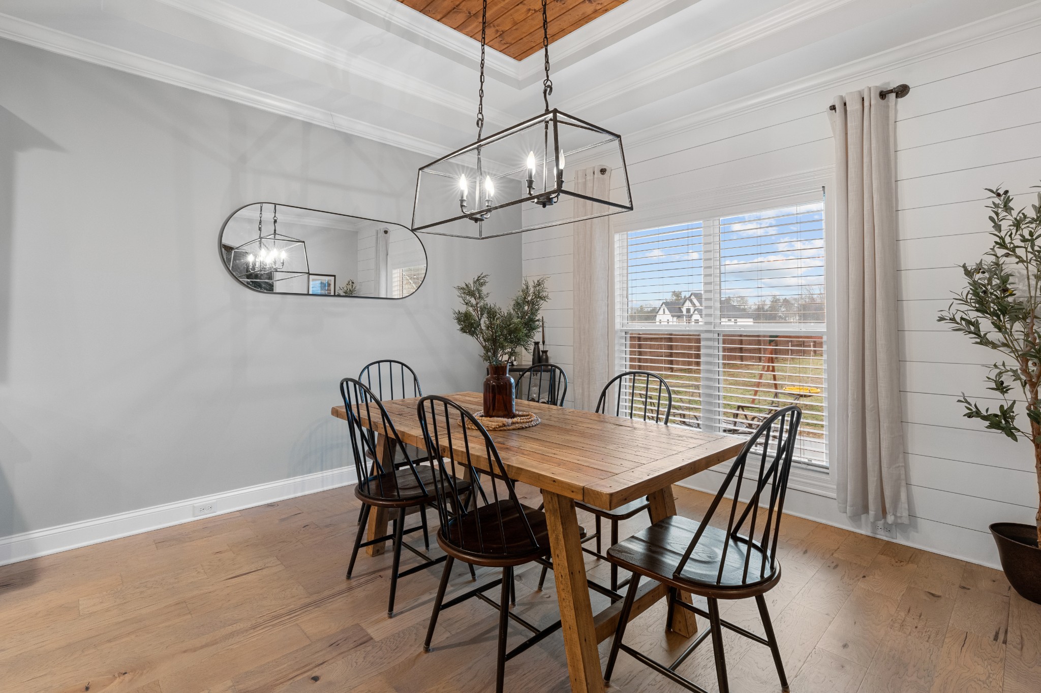 111 Flat Woods Road Lebanon, TN 37090 - Photo 25 of 60 a view of a dining room with furniture window and wooden floor