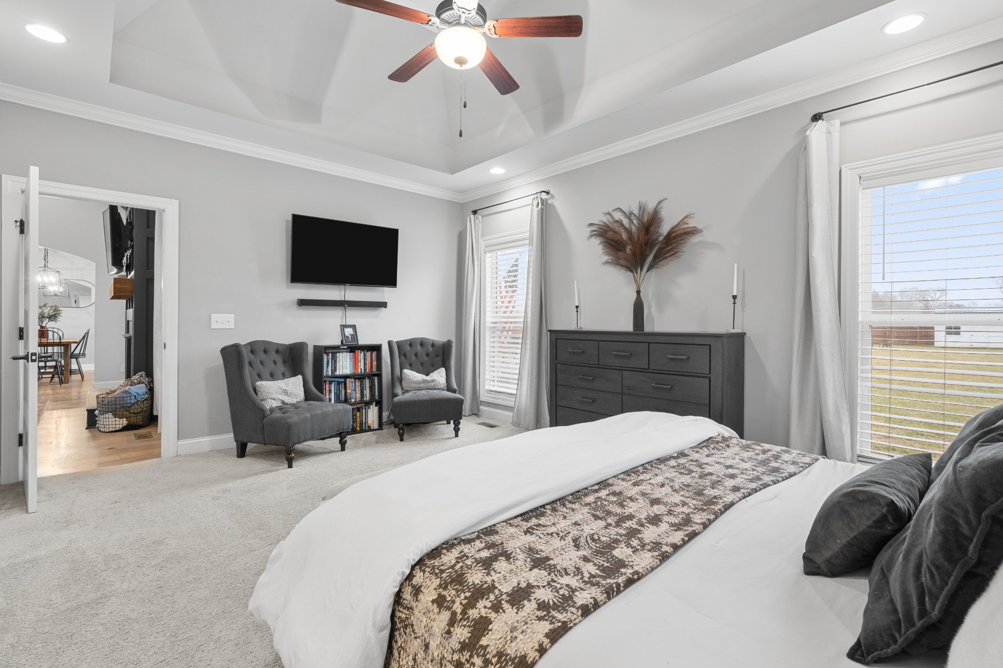 111 Flat Woods Road Lebanon, TN 37090 - Photo 28 of 60 a bedroom with a large bed and a flat tv screen