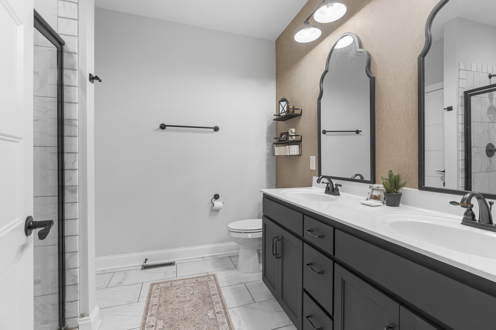 111 Flat Woods Road Lebanon, TN 37090 - Photo 31 of 60 a bathroom with a double vanity sink toilet and mirror