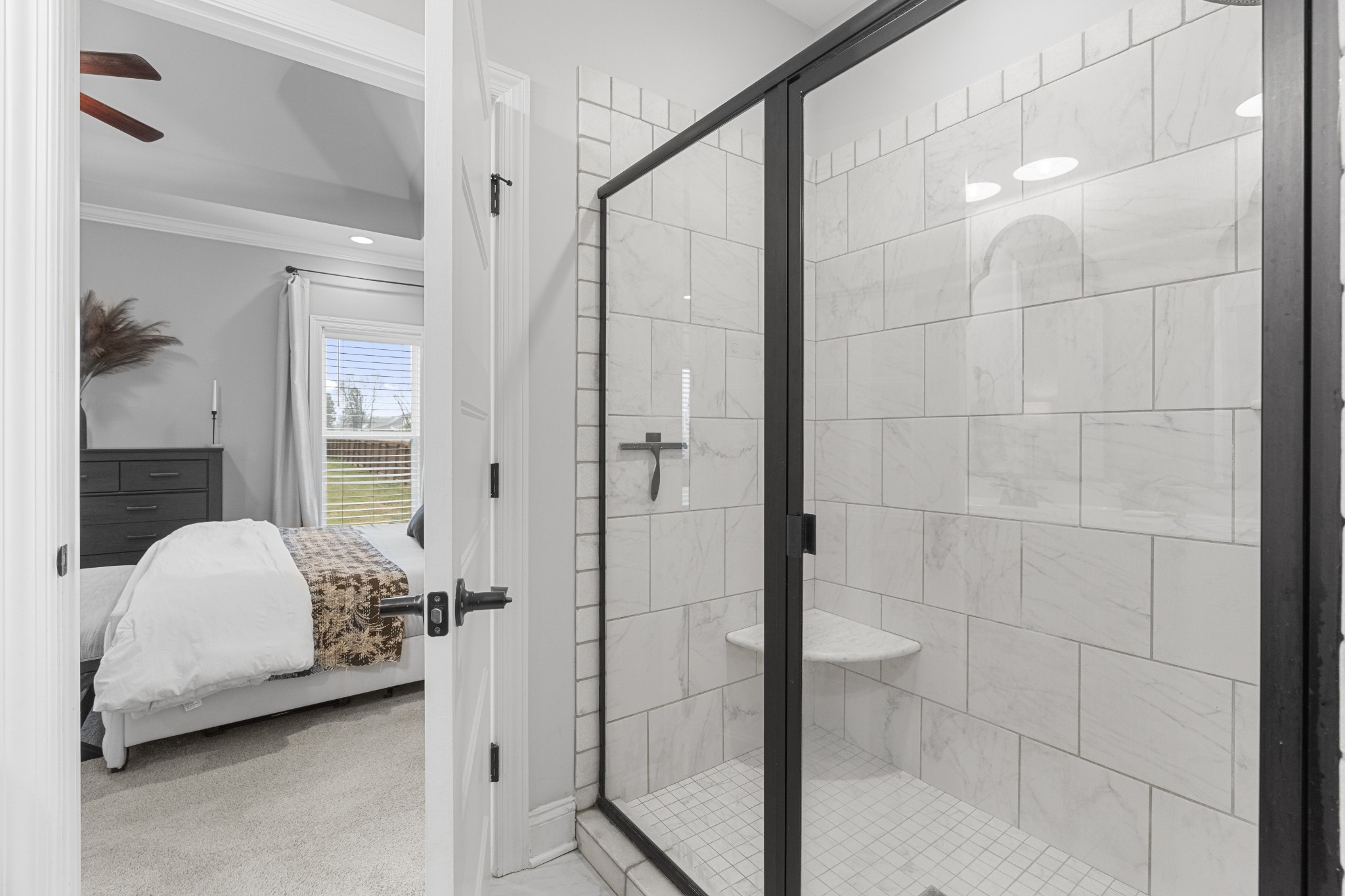 111 Flat Woods Road Lebanon, TN 37090 - Photo 33 of 60 a bedroom with a bed and a mirror