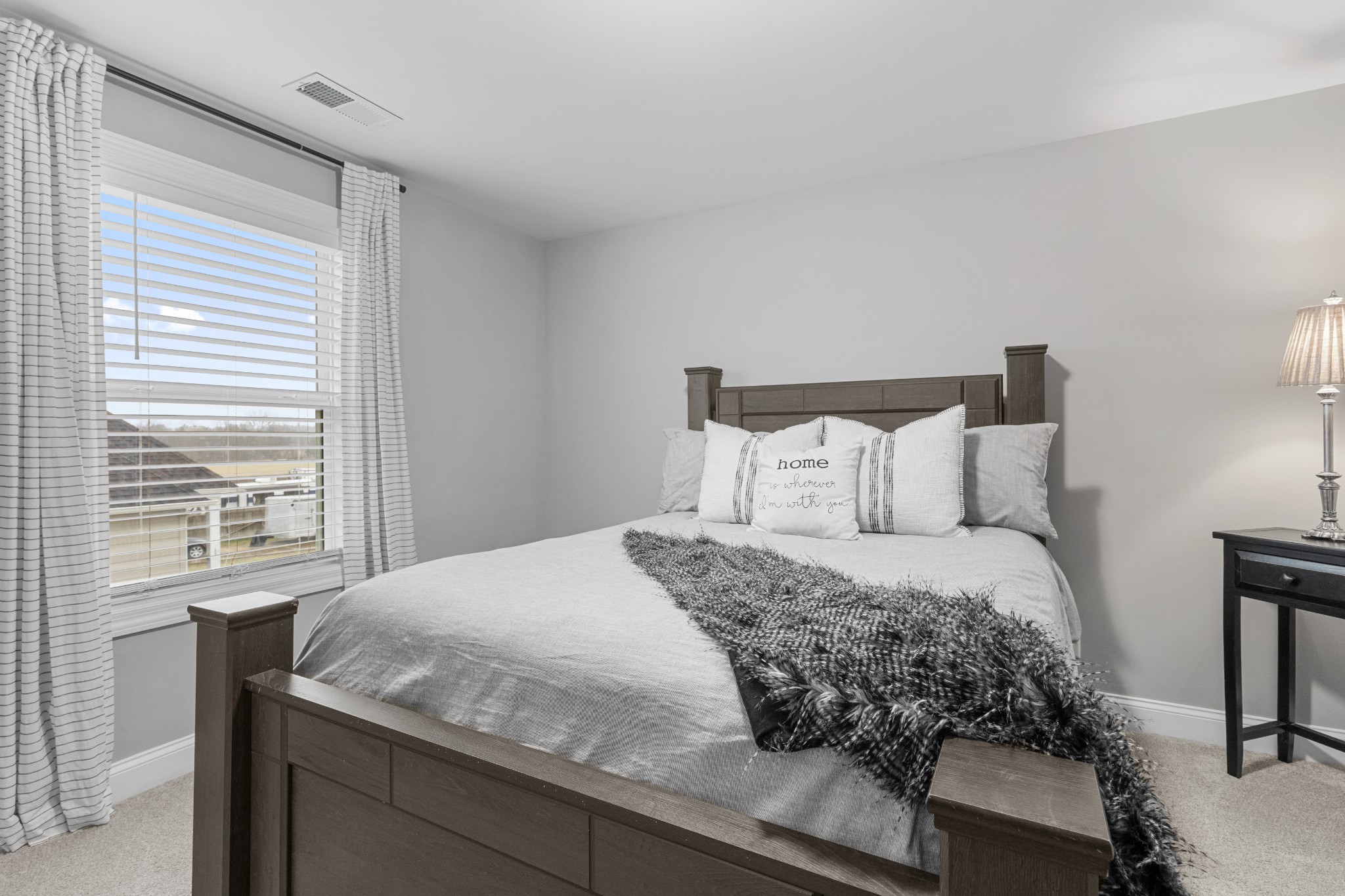 111 Flat Woods Road Lebanon, TN 37090 - Photo 46 of 60 a bedroom with a bed and window