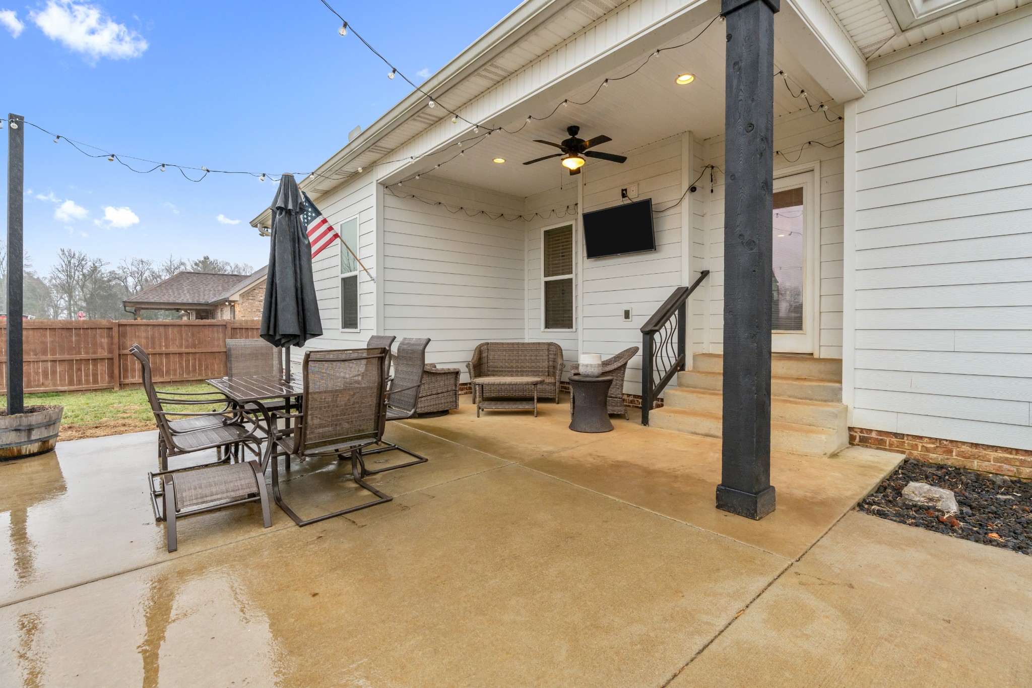 111 Flat Woods Road Lebanon, TN 37090 - Photo 49 of 60 a view of a patio with a table and chairs and a barbeque