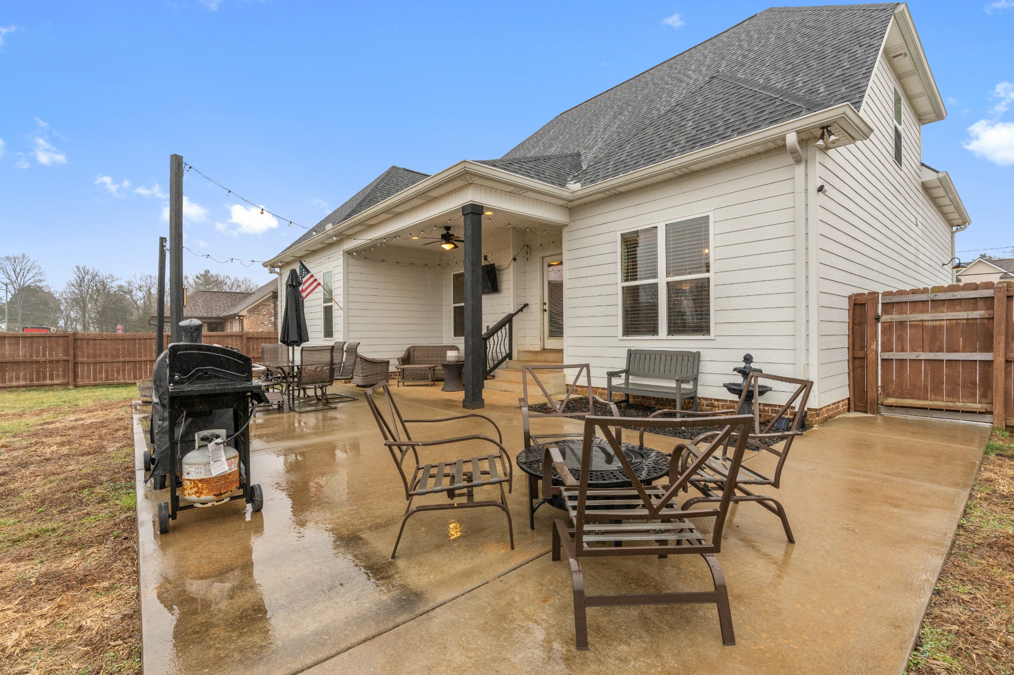 111 Flat Woods Road Lebanon, TN 37090 - Photo 52 of 60 a view of a patio with table and chairs and potted plants