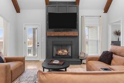 111 Flat Woods Road Lebanon, TN 37090 - Photo 6 of 60 a living room with furniture a fireplace and a flat screen tv