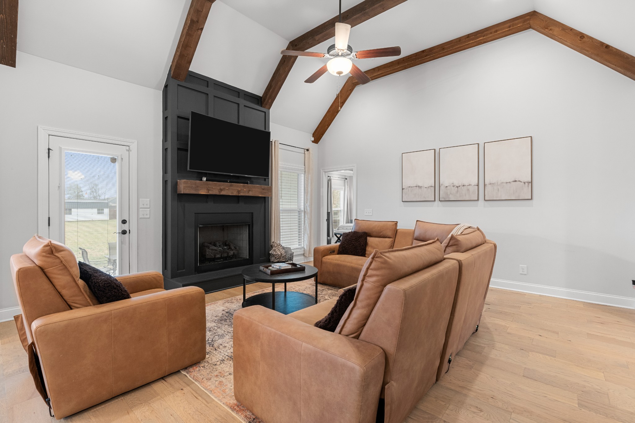 111 Flat Woods Road Lebanon, TN 37090 - Photo 7 of 60 a living room with furniture a flat screen tv and a fireplace