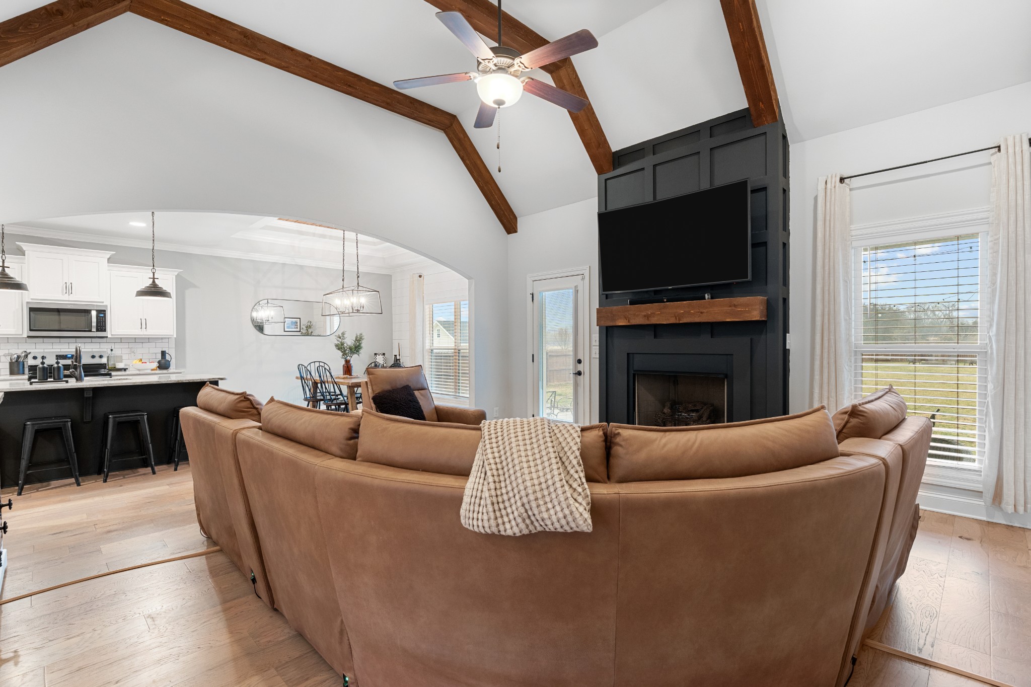 111 Flat Woods Road Lebanon, TN 37090 - Photo 8 of 60 a living room with fireplace furniture and a flat screen tv