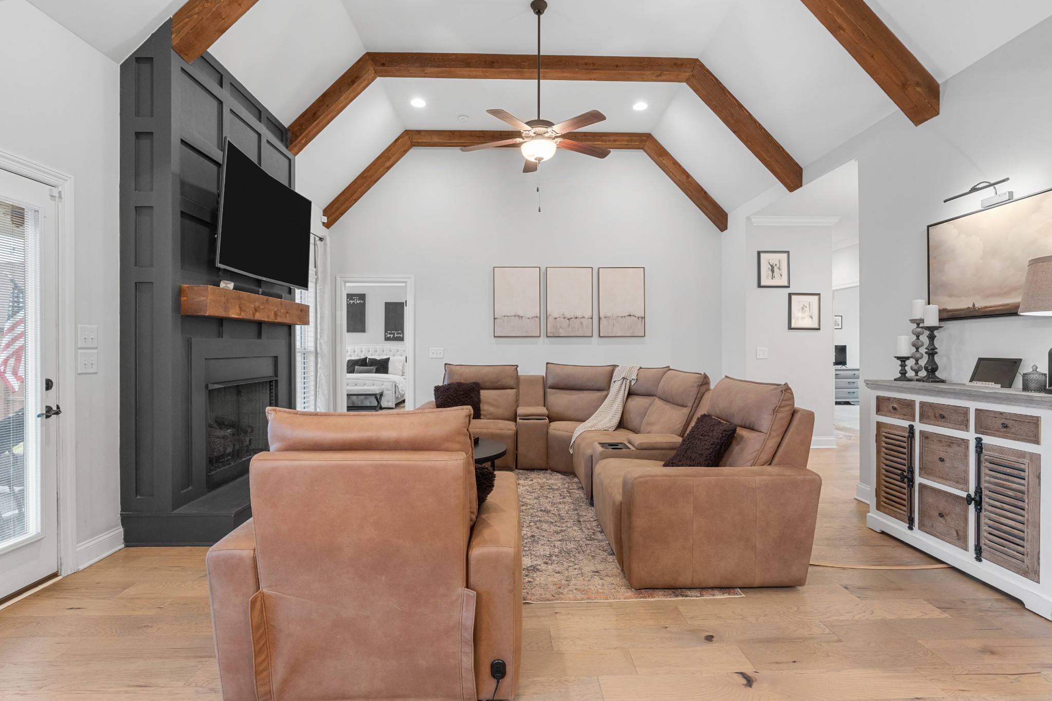 111 Flat Woods Road Lebanon, TN 37090 - Photo 9 of 60 a living room with furniture a flat screen tv and a fireplace