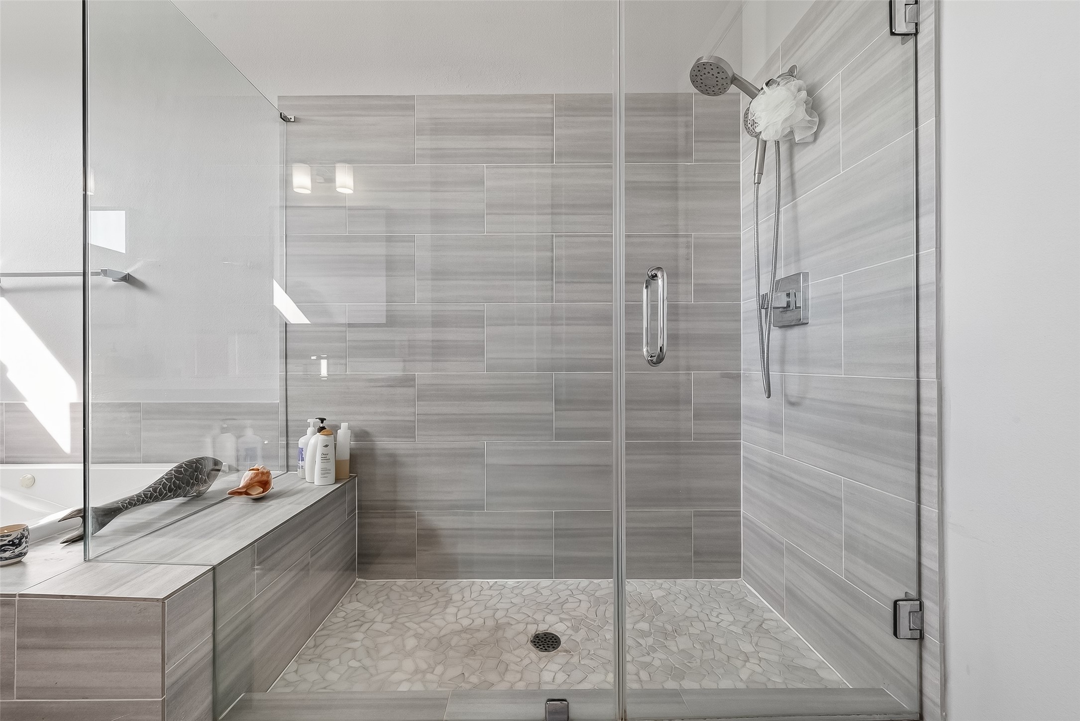606 Pacific Street Houston, TX 77006 - Photo 35 of 41 a bathroom with a shower and a sink