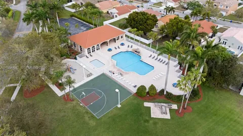 an aerial view of a house with a garden