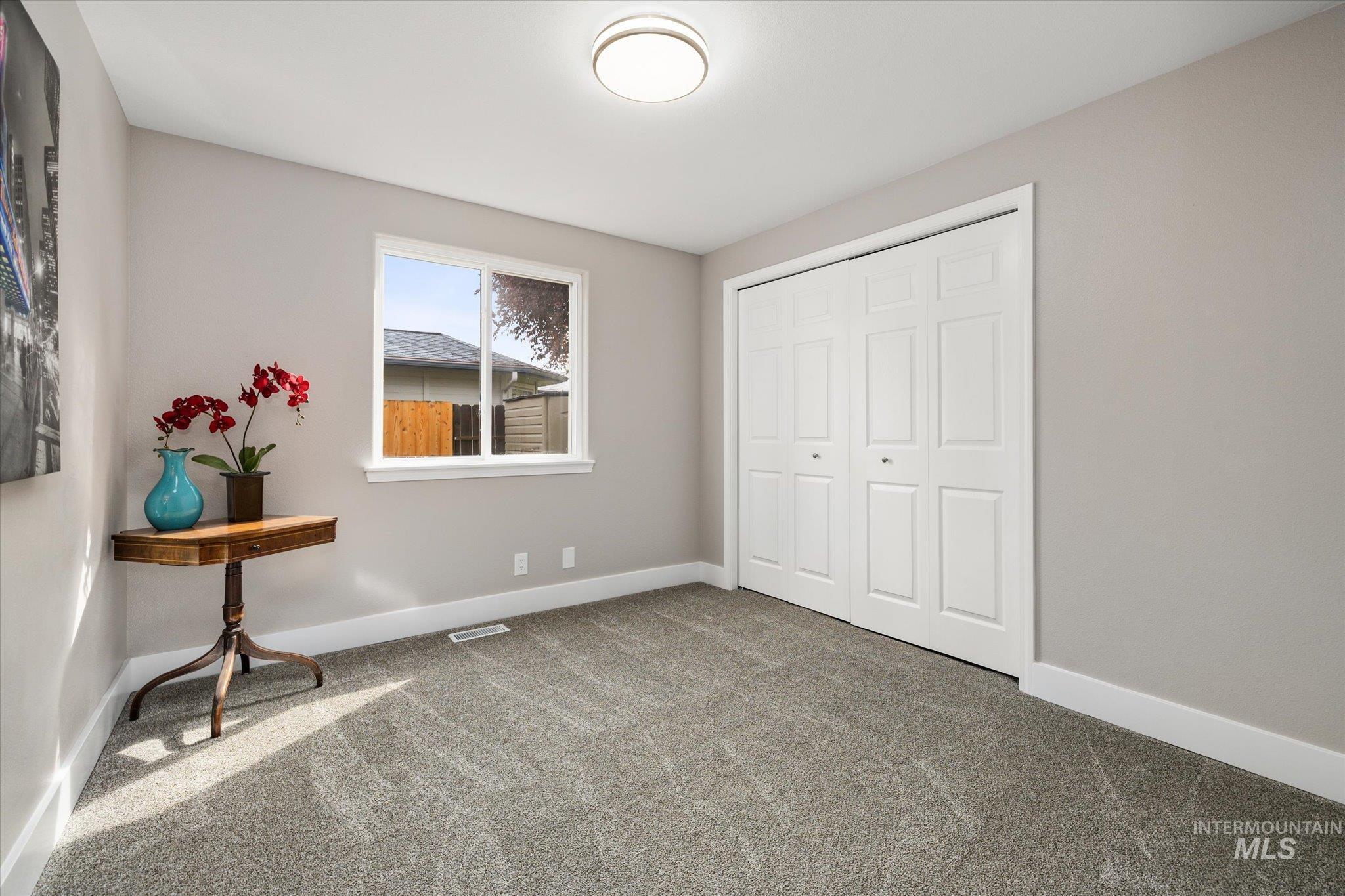 2250 North Amethyst Avenue Meridian, ID 83646 - Photo 38 of 50 Carpeted bedroom with baseboards and a closet