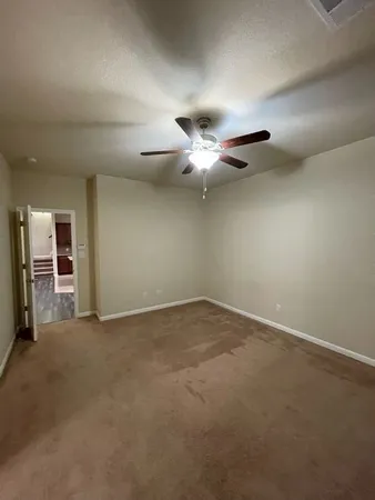 a view of staircase and living room with wooden floor