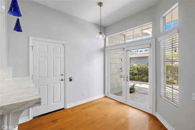 a view of a hallway with a chandelier