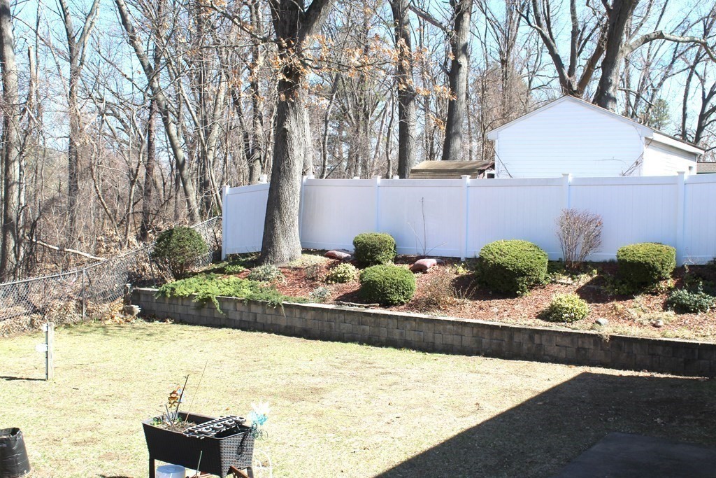 48 Bexhill Street Springfield, MA 01119 - Photo 3 of 14 a view of a backyard