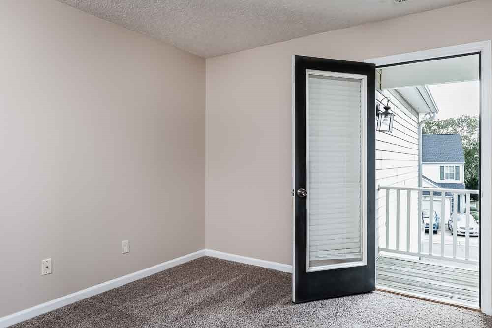 2044 Persimmon Ridge Drive Raleigh, NC 27604 - Photo 20 of 30 Such a charming room with its own Juliette balcony! Bedroom 3