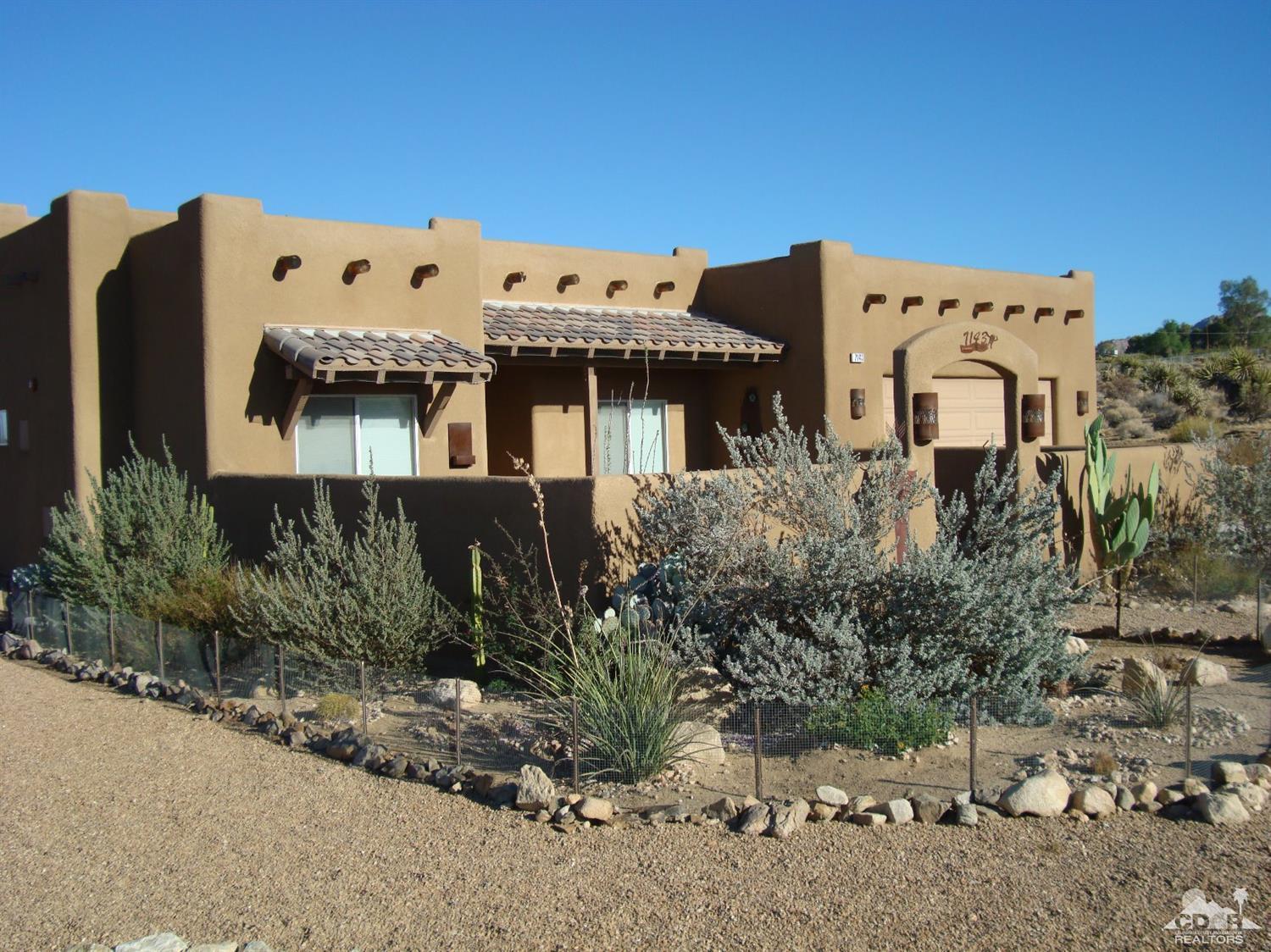 7143 Juniper Road Joshua Tree, CA 92252 - Photo 3 of 24 a view of a house with outdoor space