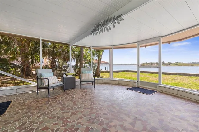 a view of cabinets window with wooden floor