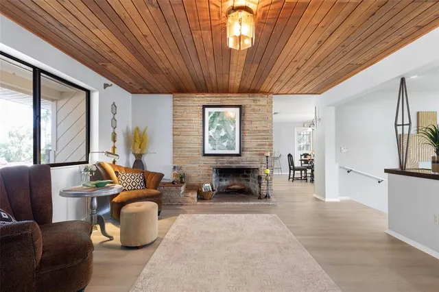 a kitchen with granite countertop white cabinets white stainless steel appliances with a sink and dishwasher