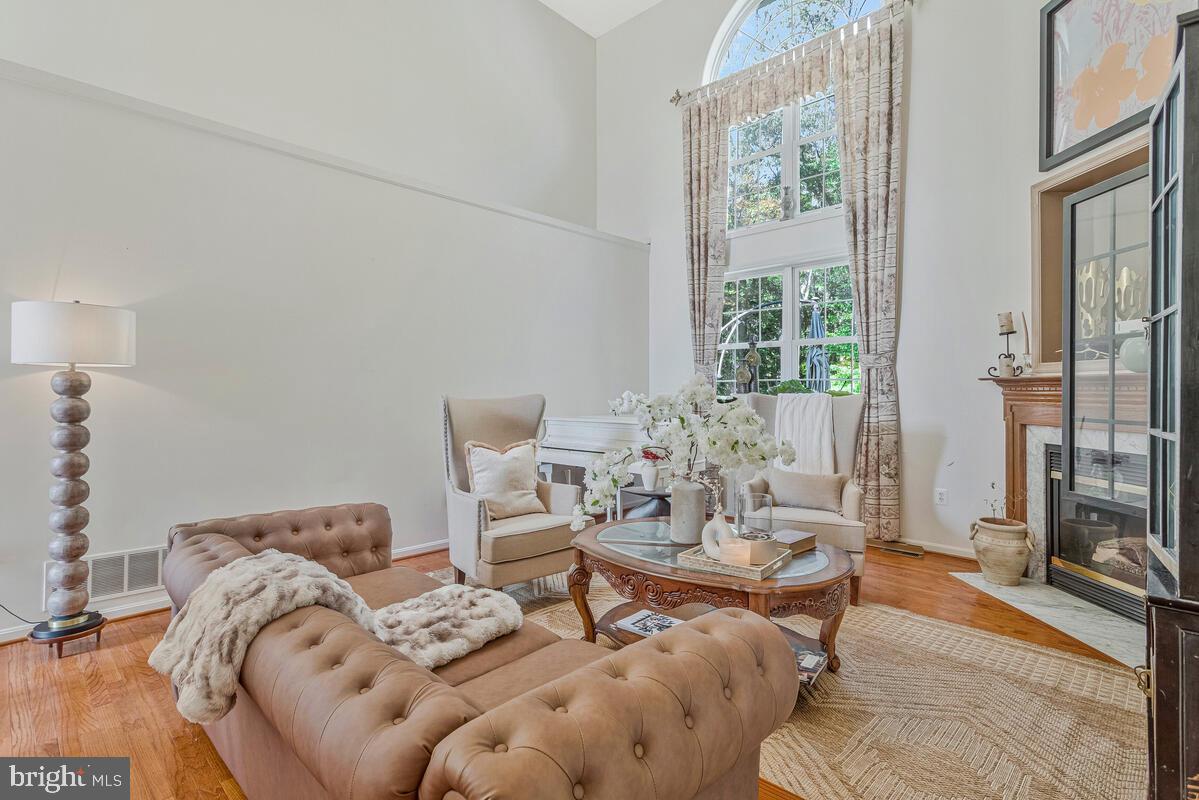 215 Hoile Lane Huntingtown, MD 20639 - Photo 11 of 52 a living room with furniture and a large window