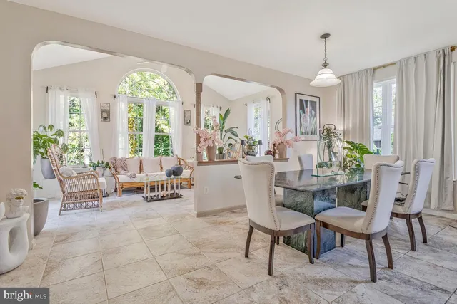 a view of a livingroom with furniture window and outdoor seating