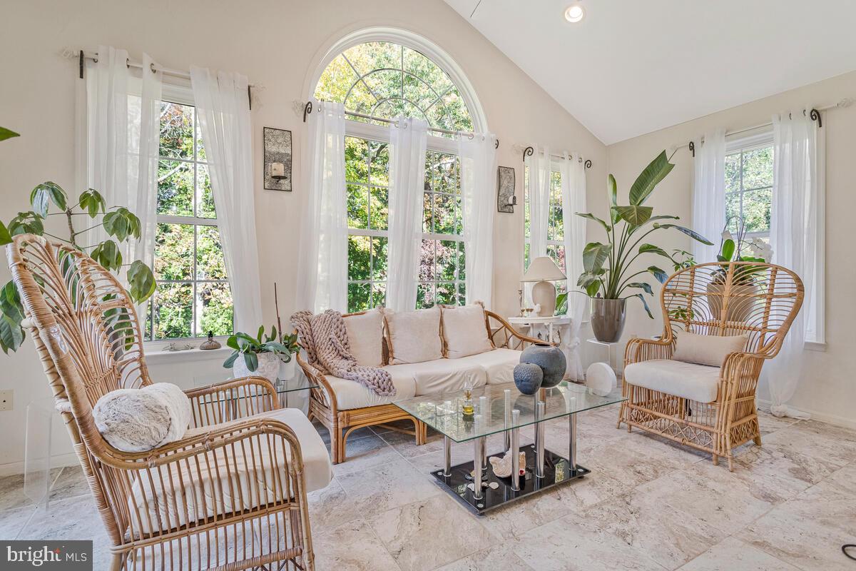 215 Hoile Lane Huntingtown, MD 20639 - Photo 21 of 52 a living room with furniture and a large window