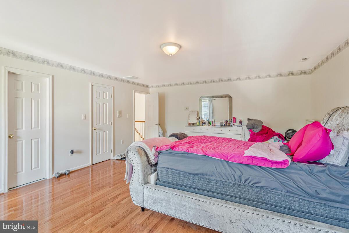 215 Hoile Lane Huntingtown, MD 20639 - Photo 29 of 52 a bedroom with a bed and a room