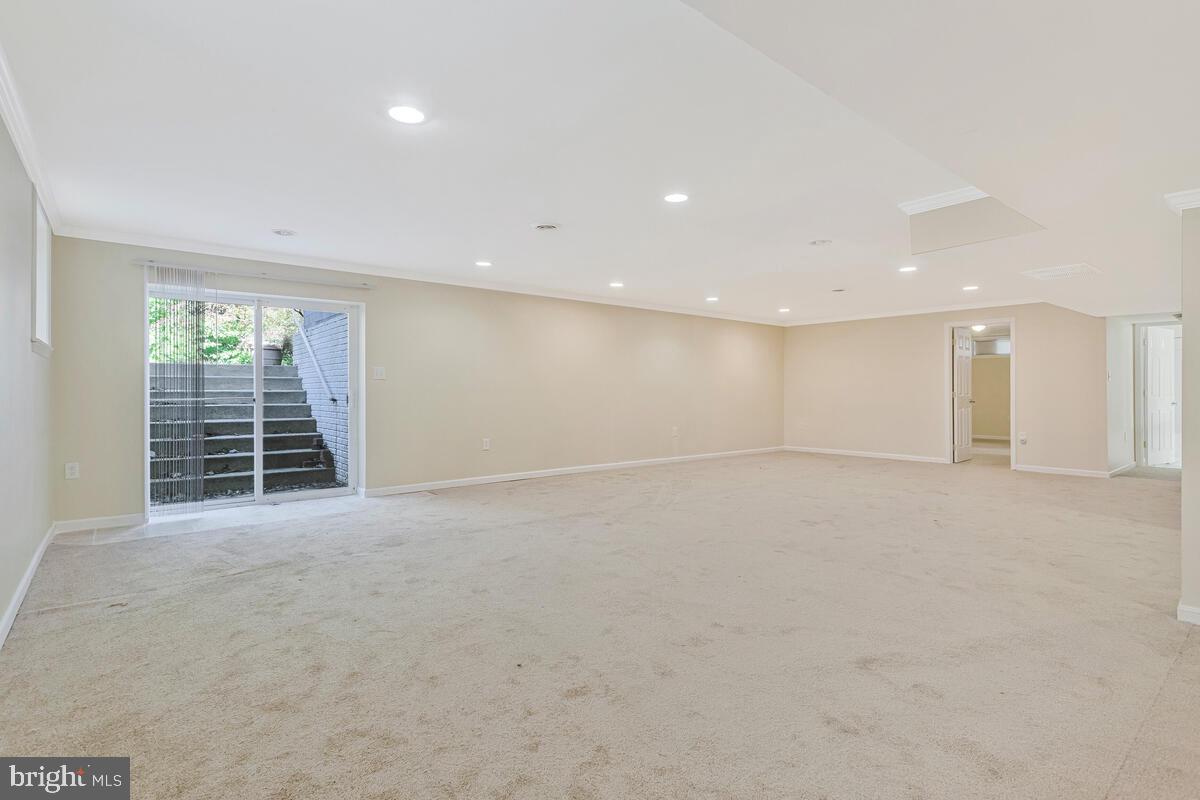 215 Hoile Lane Huntingtown, MD 20639 - Photo 44 of 52 a view of an empty room with a window
