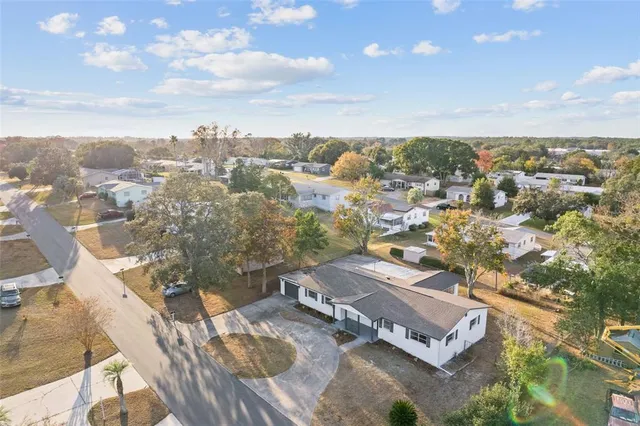 a house with a tree in front of it