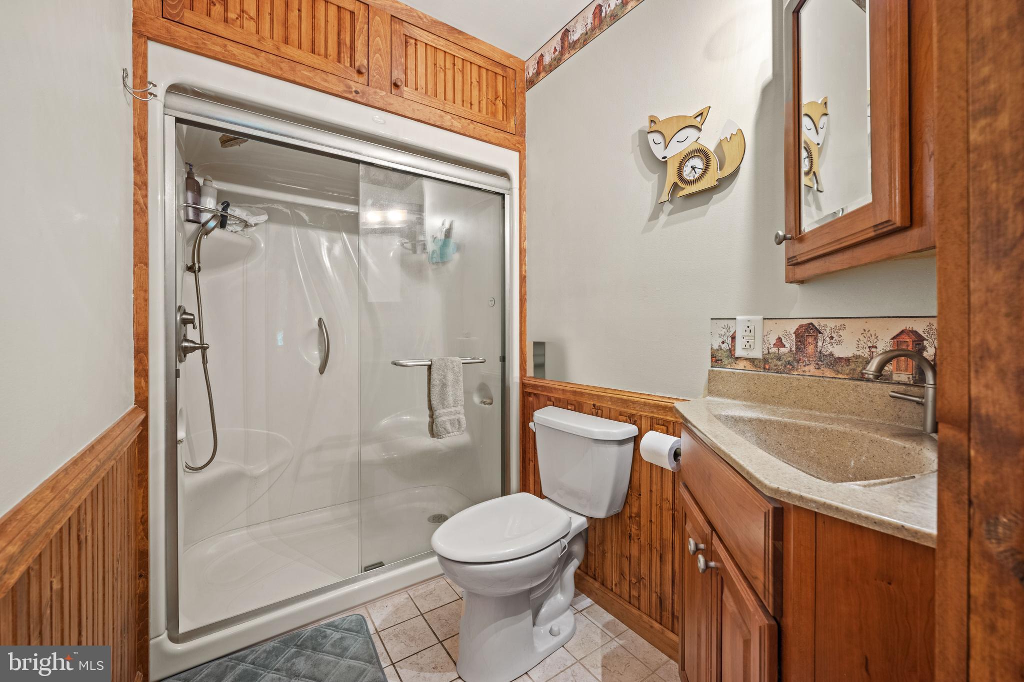 291 Acton Station Road Salem, NJ 08079 - Photo 32 of 45 a bathroom with a sink a toilet and shower