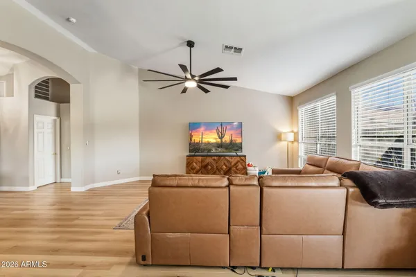 a living room with furniture and a window